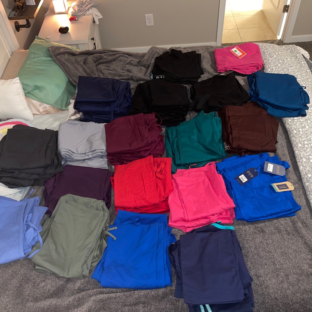 19 pair of Cherokee sets top is medium and bottom is small tall some are large